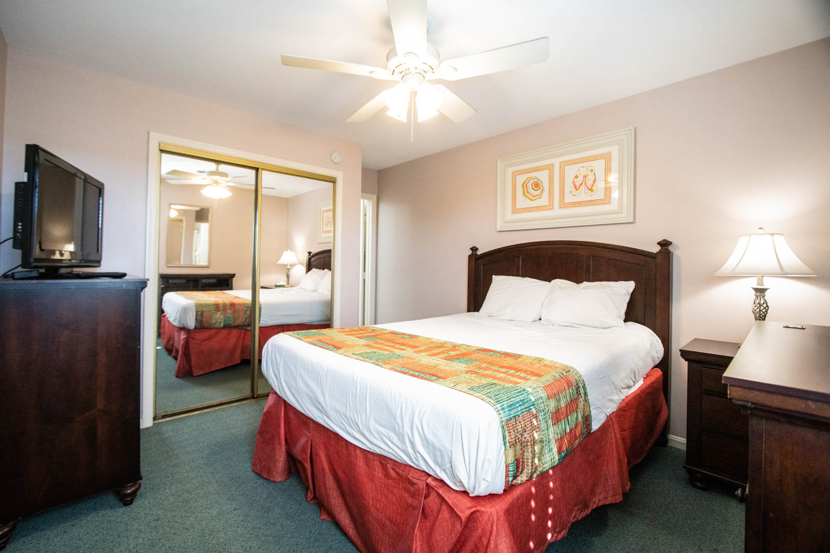 A cozy bedroom at VRI's Club Ocean Villas II in Ocean City, Maryland.